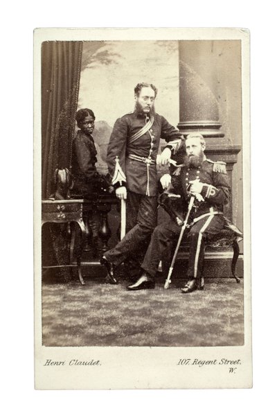 Officers with a boy, London by Henri Claudet